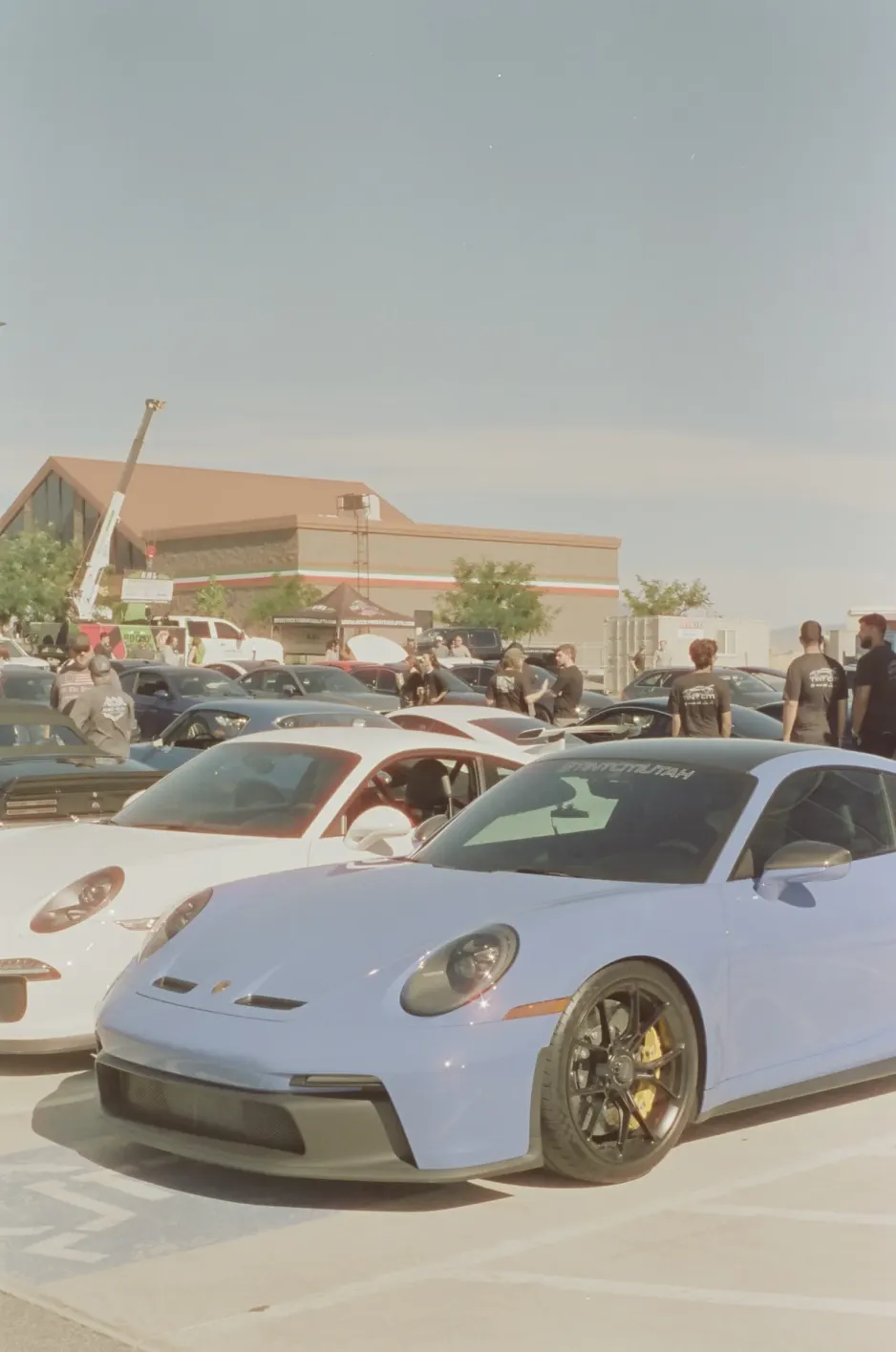 A blue Porsche 911 GT3 parked at a JDC meet