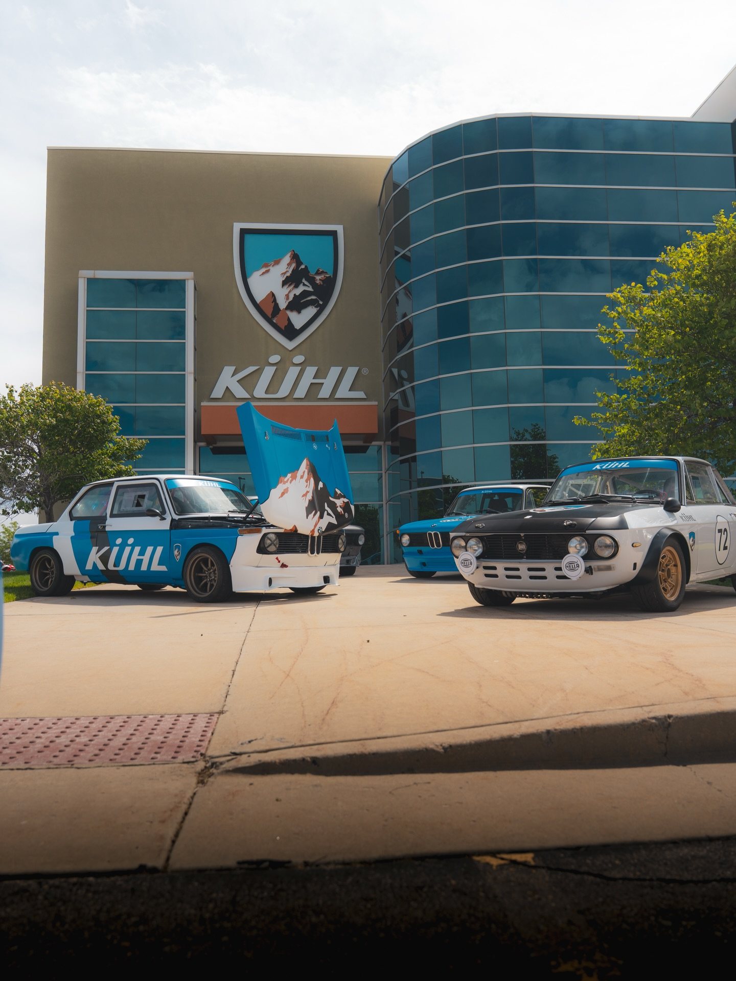 KÜHL headquarters in Salt Lake City with the KÜHL race cars parked out front